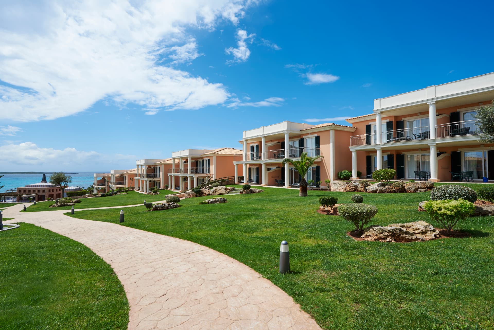 Zona ajardinada exterior de Punta Prima